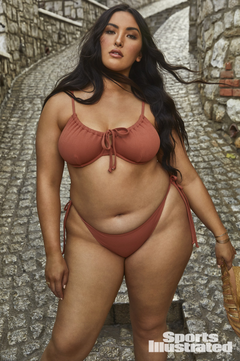 Yumi Nu was photographed by James Macari in Montenegro. Swimsuit by Toluca Swim. Hat by New York Vintage. Bracelets and rings by SOKO.